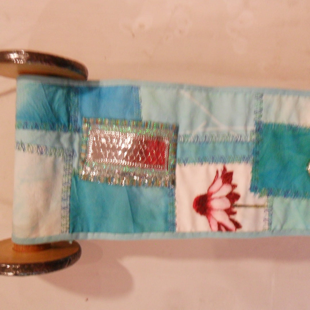 Bobbin tales workshop at Eau Brink Studio. Industral bobbin with stitched workshop to create a hanging