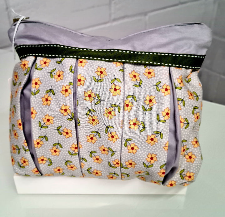 Yellow Flowers on Grey with Black and Grey Trim: Pleated Cosmetic Bag