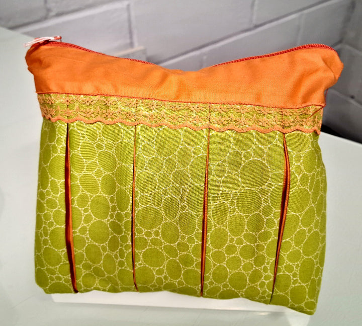 Green Bubble fabric with Orange Trim: Pleated Cosmetic Bag