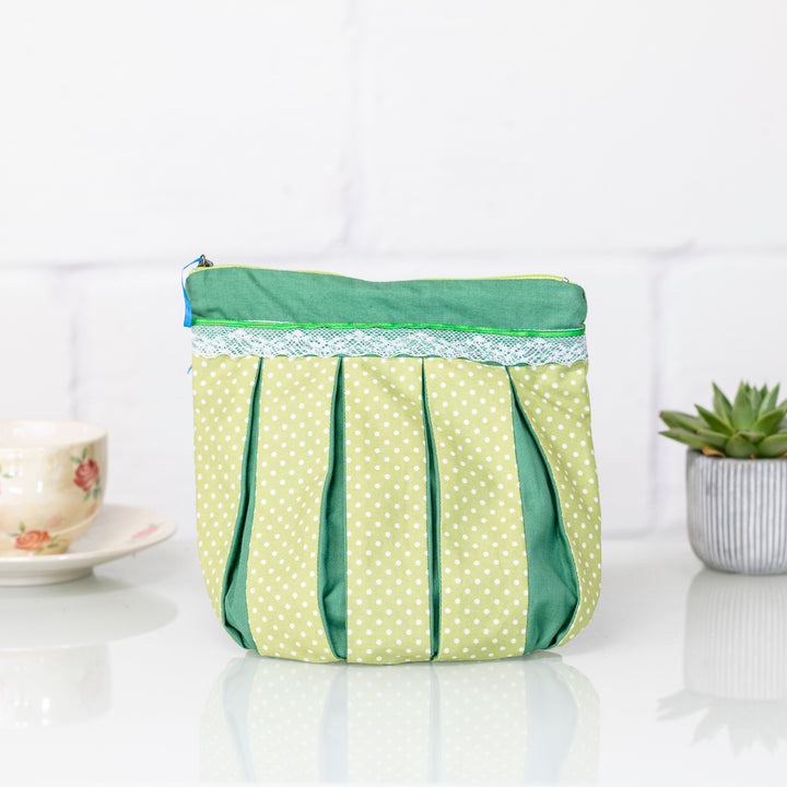 Green Bubble fabric with Orange Trim: Pleated Cosmetic Bag